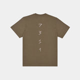 Olive, military green hemp t-shirt. Back view. White 7319 logo embroidered down spine. Not fast fashion. 