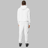 Full white hemp tracksuit. Back view. 7319 embroidered down spine. Not fast street fashion.