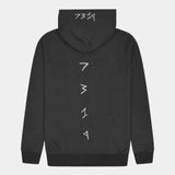 Black hemp hoodie. View from back. White embroidered logo down spine and across top of hood. Relaxed fit. Sustainable active wear.