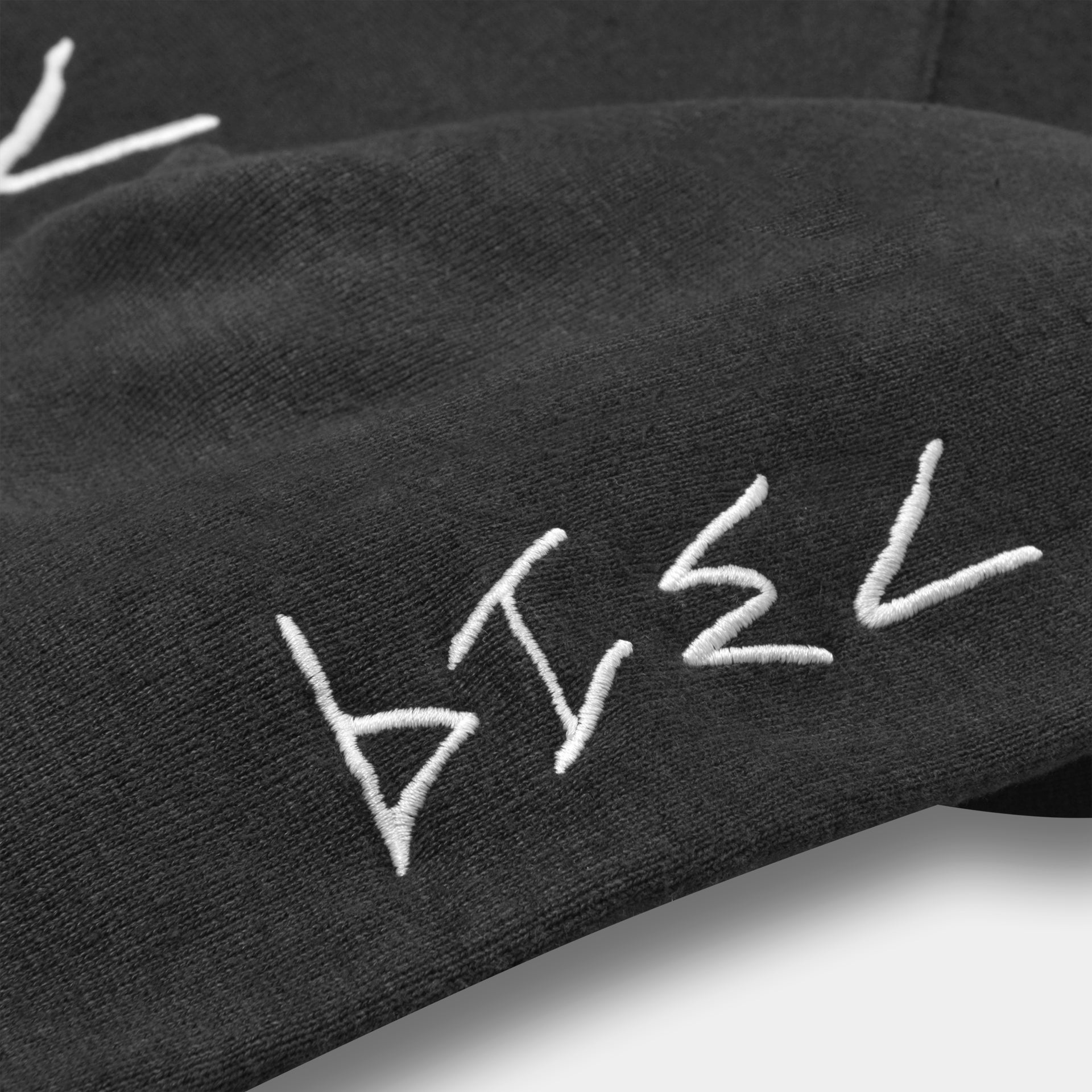 Black noir hoodie sleeve shot with 7319 logo